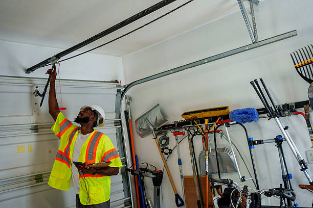 Professional Garage Door Maintenance technician working in Mansfield Center, MA